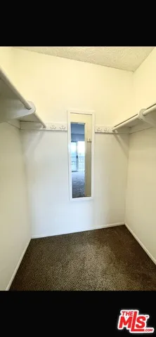 a view of kitchen island with wooden floor