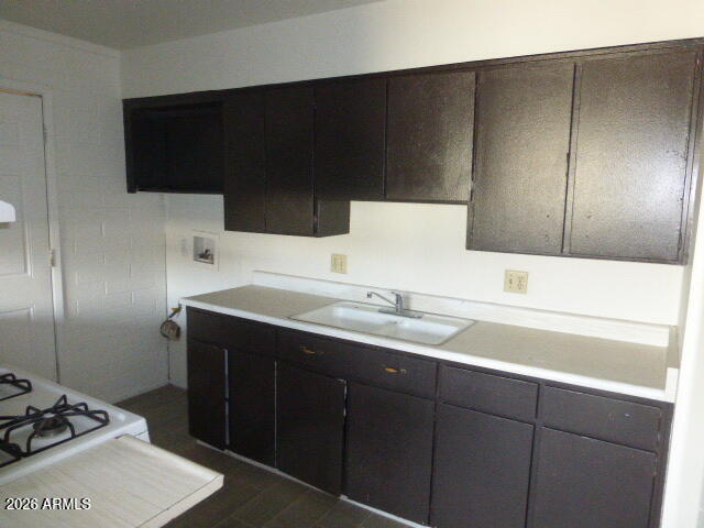 401 Greenwich Road Kearny, AZ 85137 - Photo 12 of 25 a kitchen with a sink and cabinets