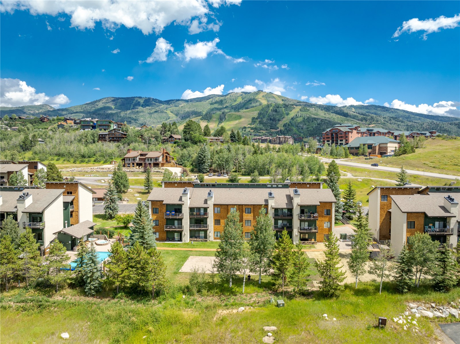 1945 Cornice Road, Unit 2221 Steamboat Springs, CO 80487 - Photo 1 of 24 a view of a city with tall buildings