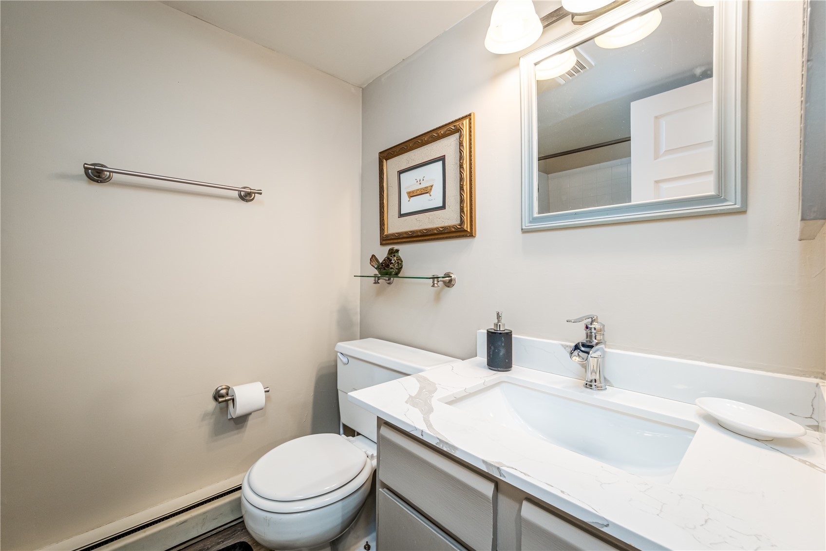 1945 Cornice Road, Unit 2221 Steamboat Springs, CO 80487 - Photo 12 of 24 a bathroom with a sink a mirror and a toilet