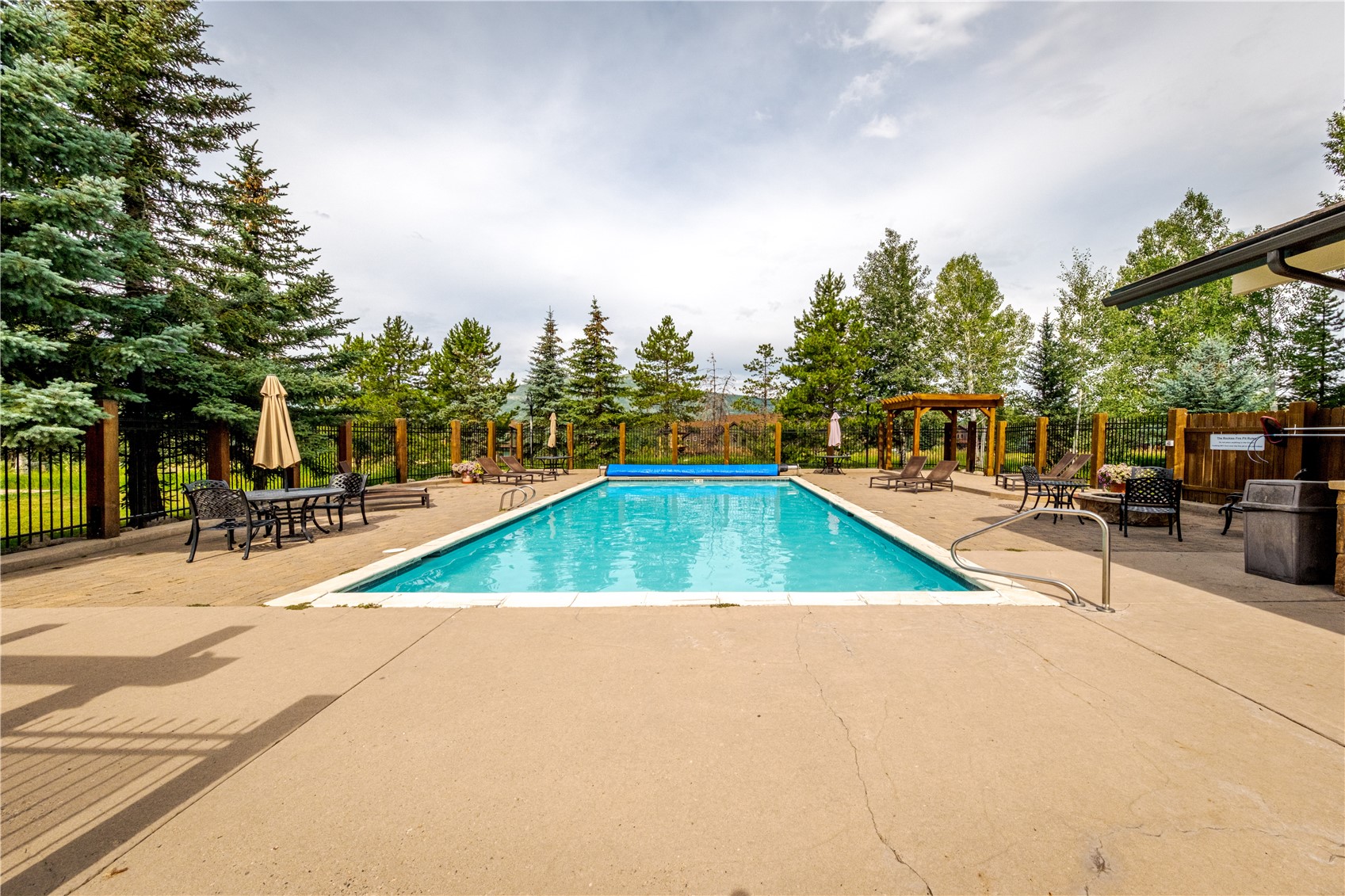 1945 Cornice Road, Unit 2221 Steamboat Springs, CO 80487 - Photo 17 of 24 a view of swimming pool with chairs
