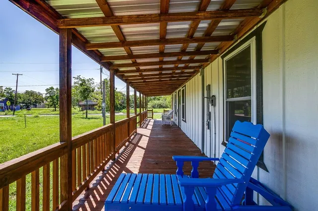 a view of outdoor space with wooden floor and outdoor space