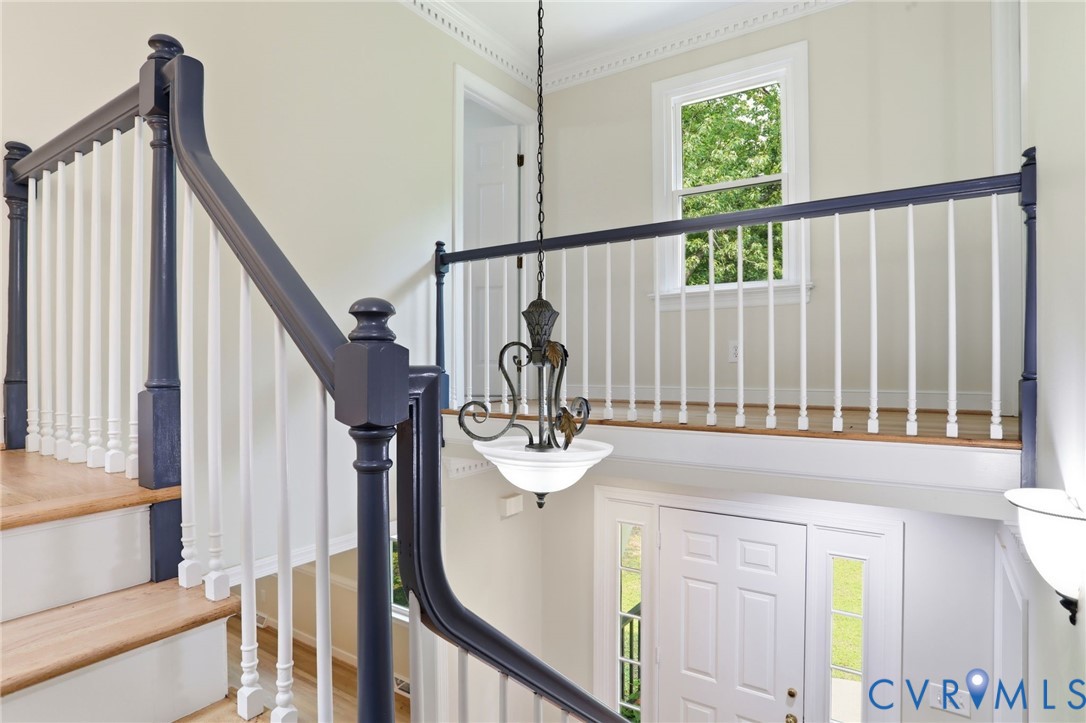 2904 Old Gun Road West Midlothian, VA 23113 - Photo 28 of 59 Two-story entryway featuring a white paneled front