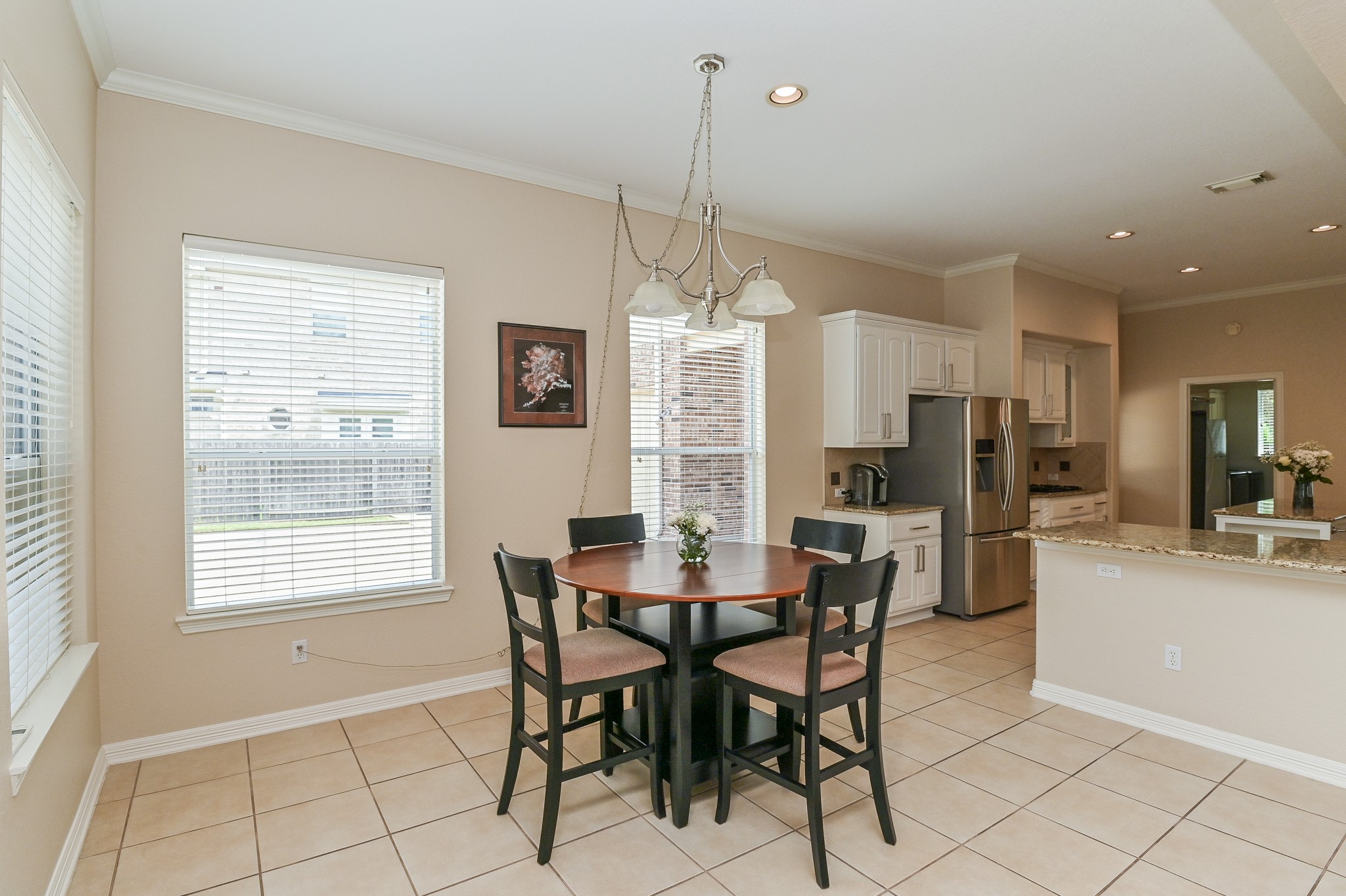 7218 Spring Run Lane Katy, TX 77494 - Photo 15 of 49 a view of a dining room with furniture window and wooden floor