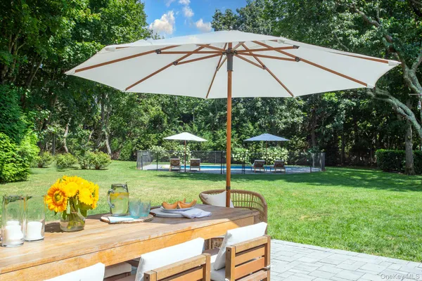 a view of a swimming pool with a patio