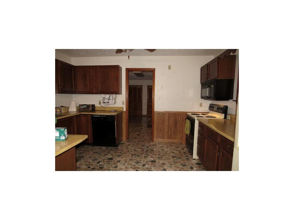 14416 Sandy Ridge Road St. Paul, VA 24283 - Photo 15 of 22 KitchenDining Room