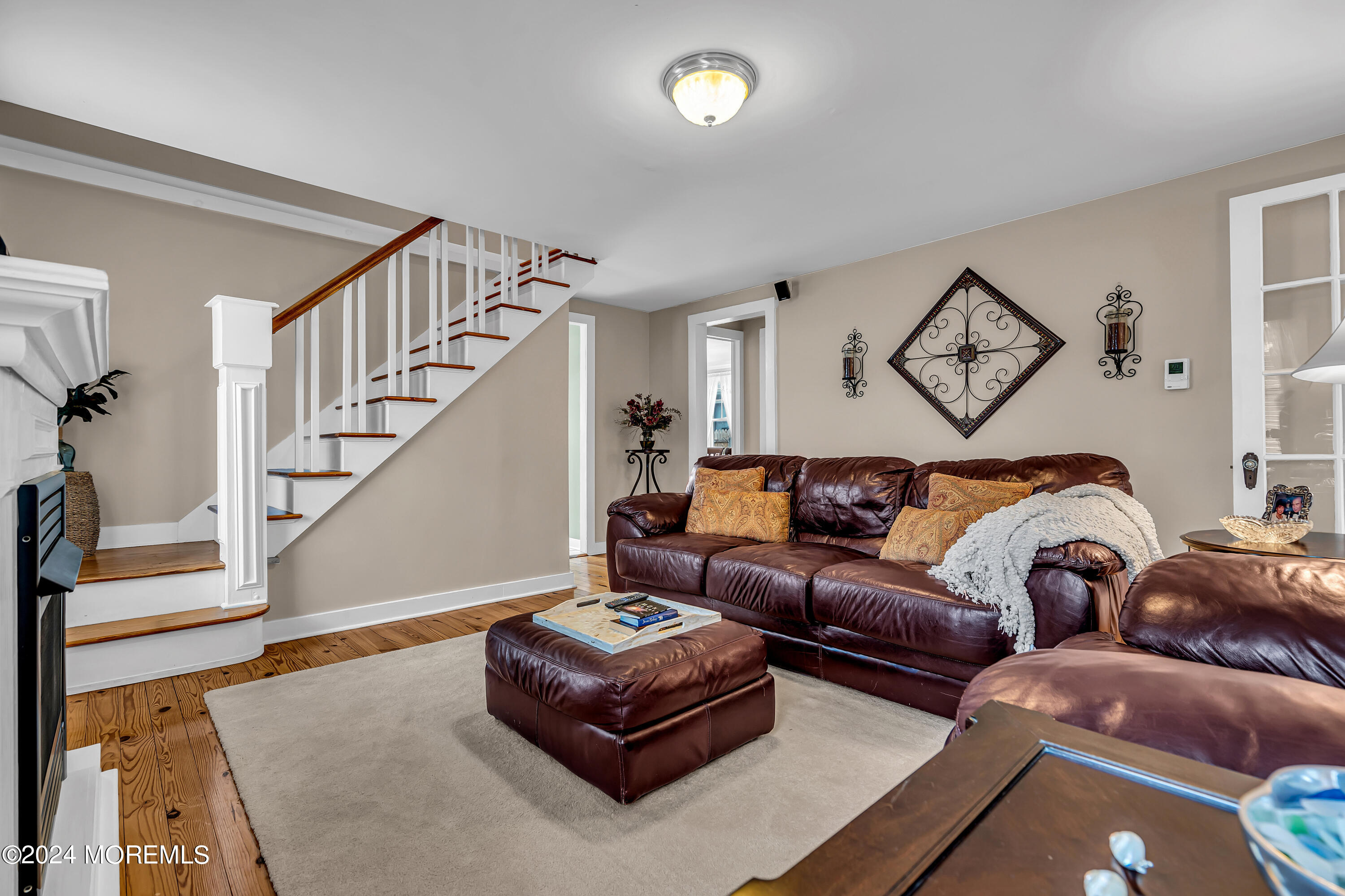 2412 Dunkle Road Point Pleasant, NJ 08742 - Photo 14 of 51 a living room with furniture and wooden floor