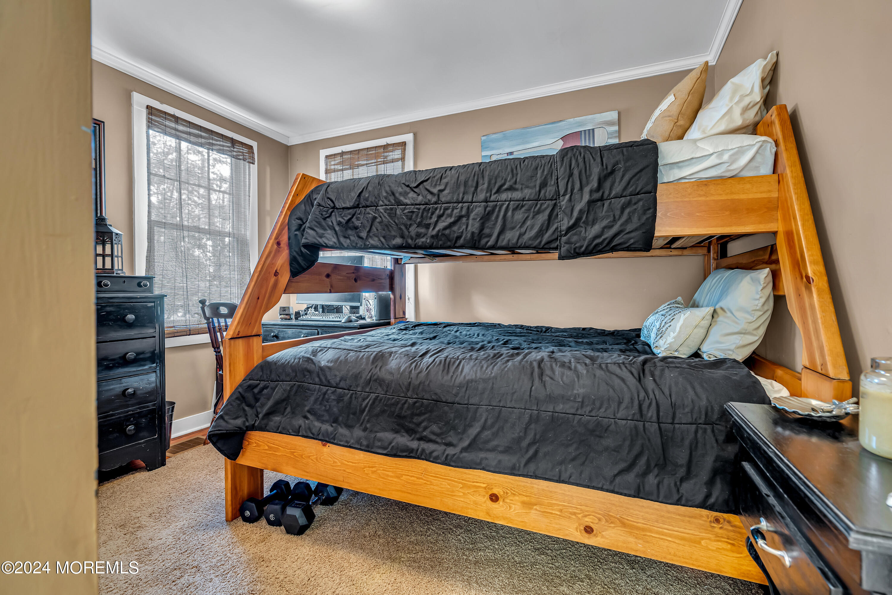 2412 Dunkle Road Point Pleasant, NJ 08742 - Photo 23 of 51 a bedroom with a bed and a window