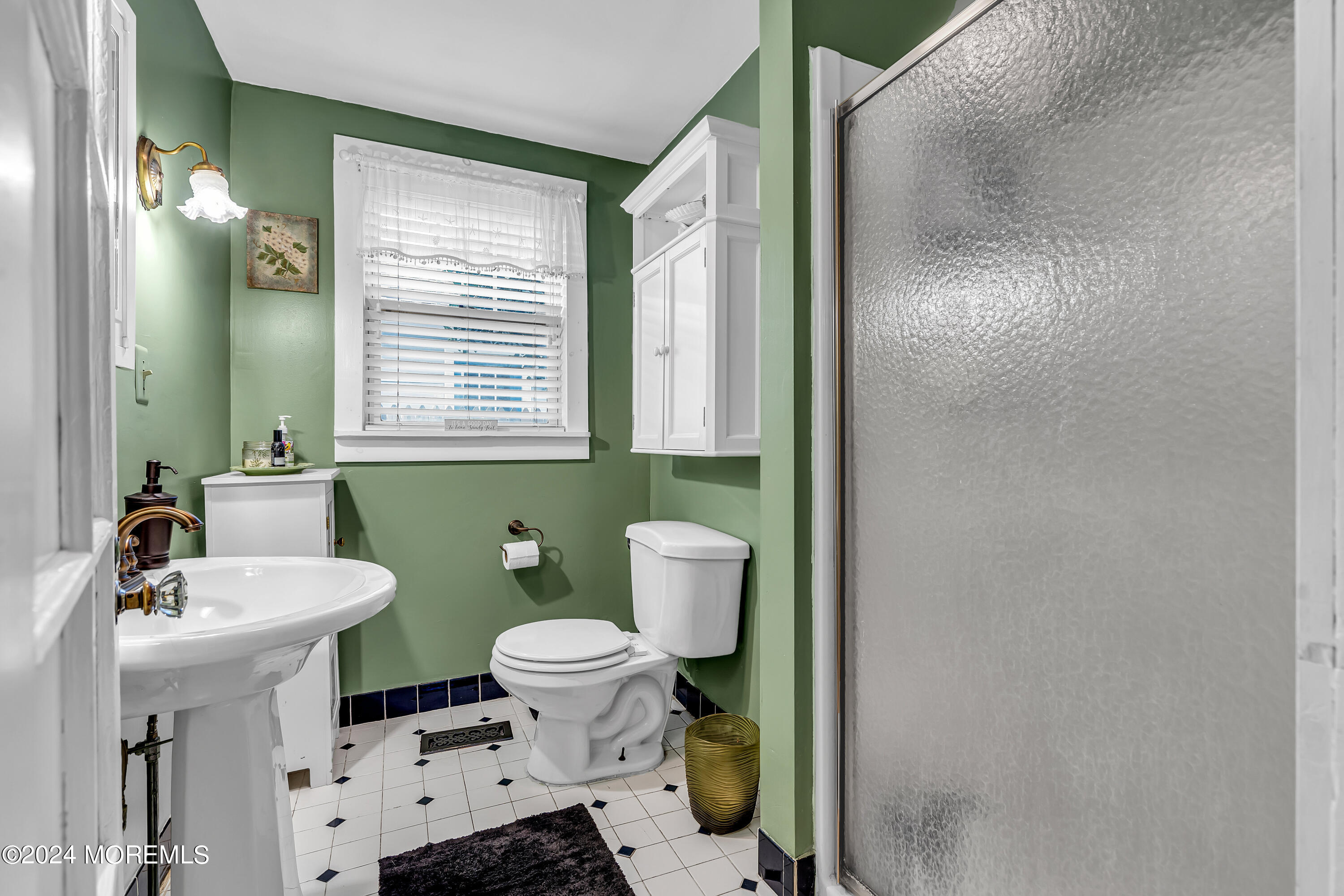 2412 Dunkle Road Point Pleasant, NJ 08742 - Photo 24 of 51 a bathroom with a toilet sink and mirror with shower