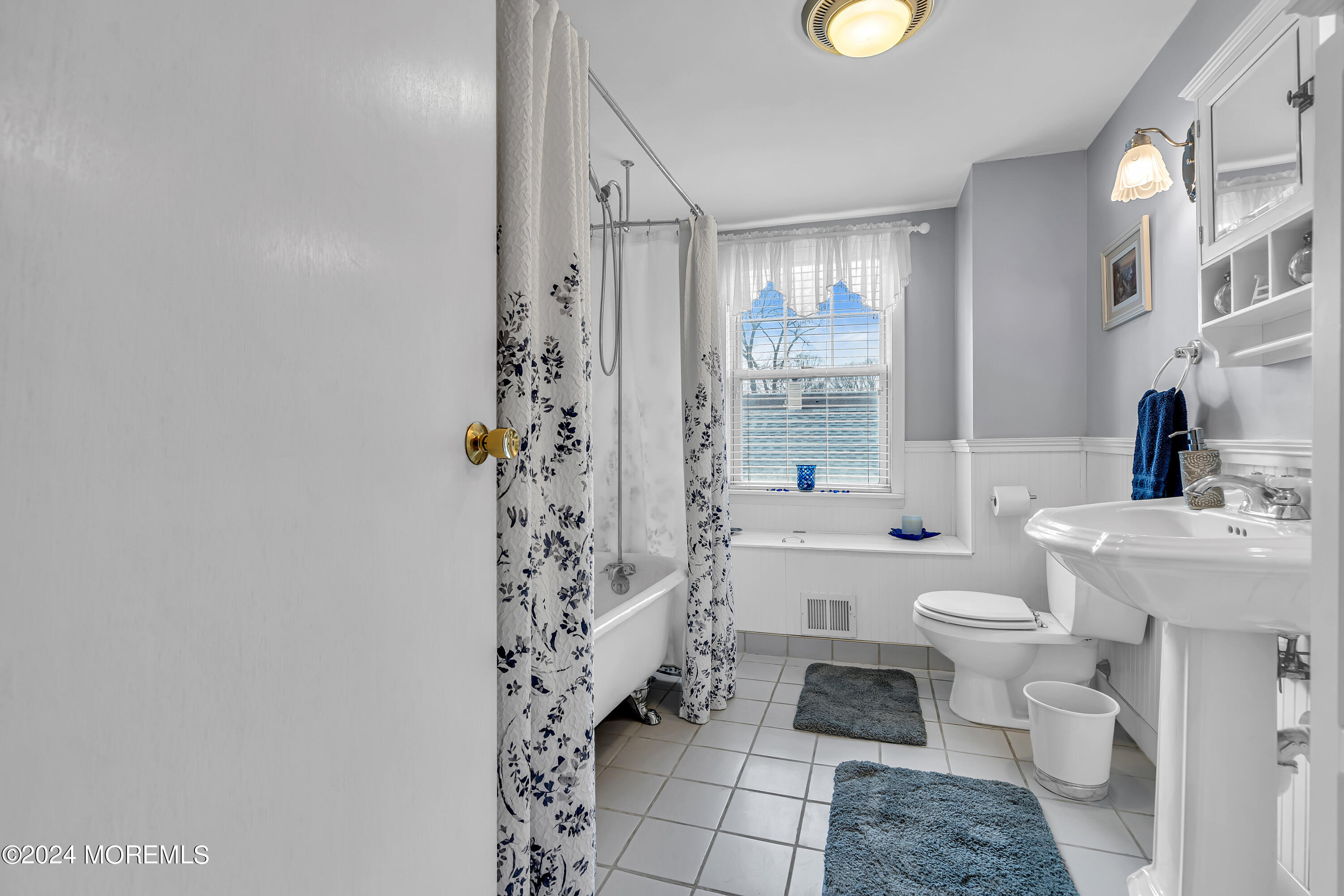 2412 Dunkle Road Point Pleasant, NJ 08742 - Photo 27 of 51 a bathroom with a toilet sink and shower