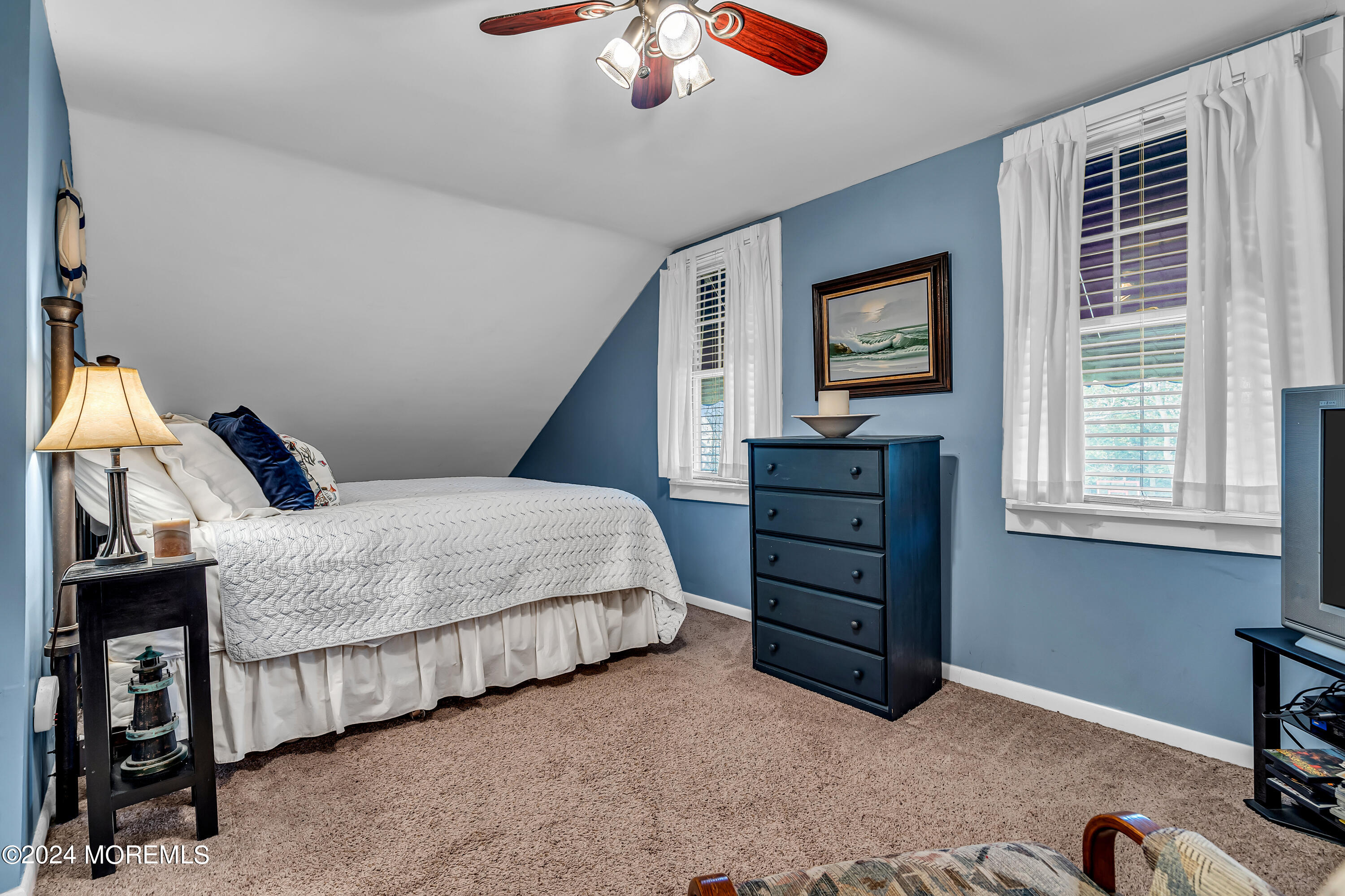 2412 Dunkle Road Point Pleasant, NJ 08742 - Photo 29 of 51 a bedroom with a bed and a window
