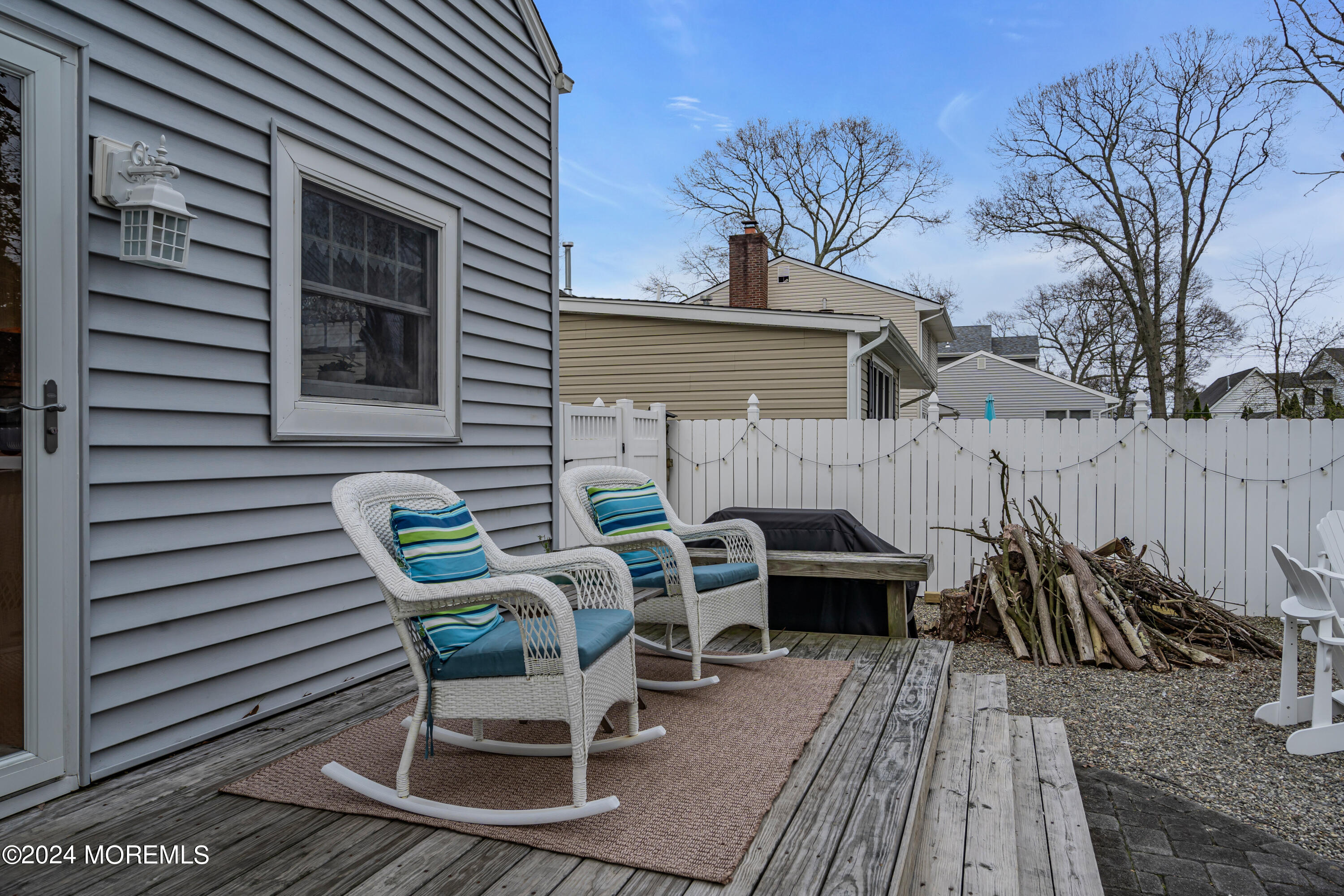2412 Dunkle Road Point Pleasant, NJ 08742 - Photo 35 of 51 a view of a table and chairs in patio of the house