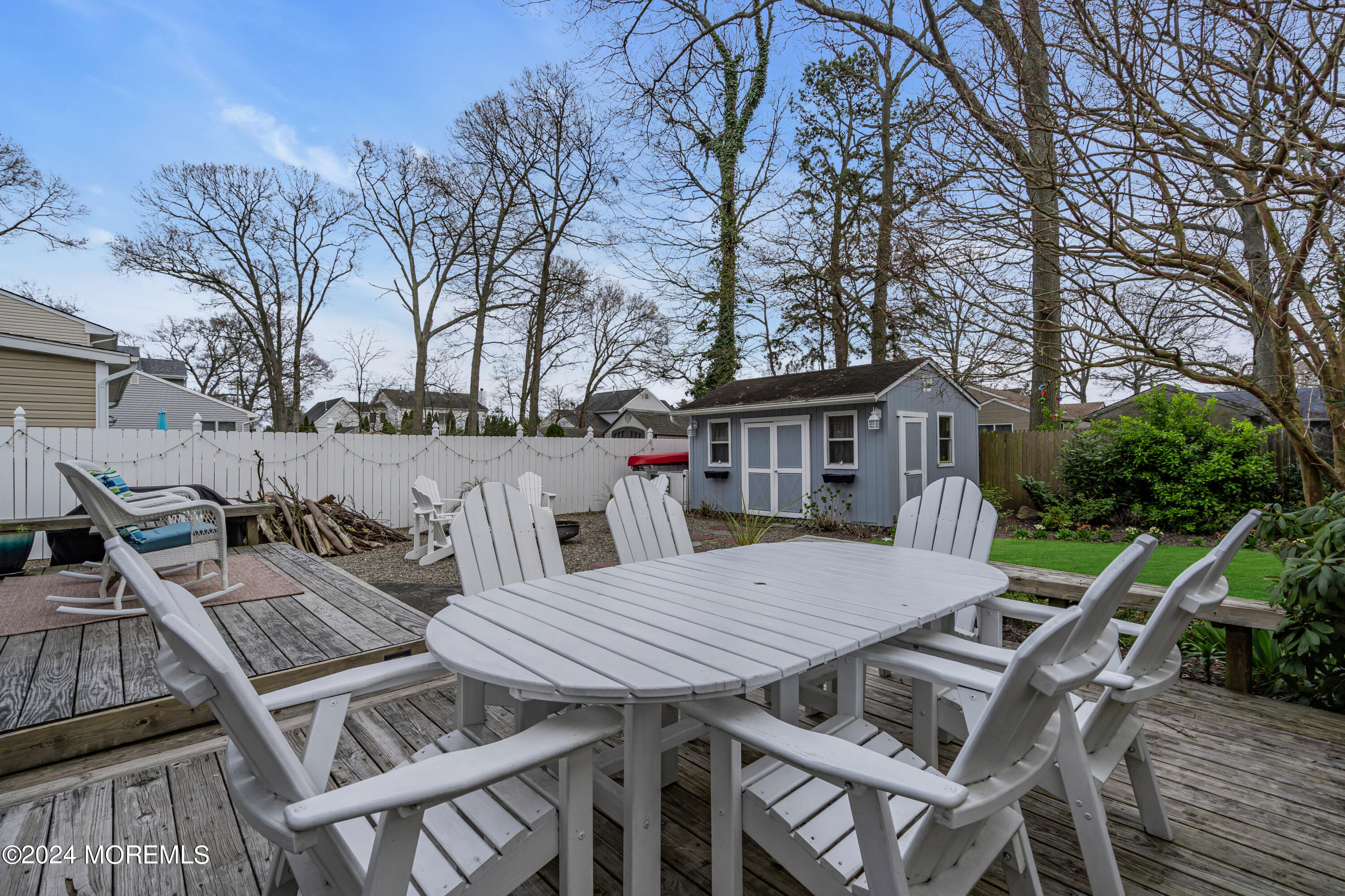 2412 Dunkle Road Point Pleasant, NJ 08742 - Photo 36 of 51 a view of a patio with table and chairs and wooden floor