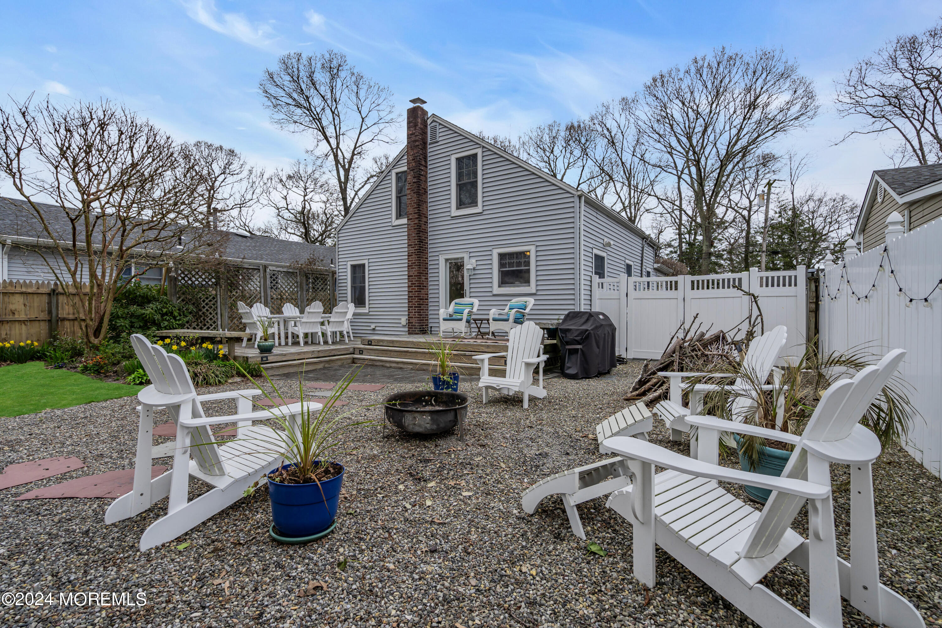 2412 Dunkle Road Point Pleasant, NJ 08742 - Photo 40 of 51 a view of a patio with couches chairs and potted plants