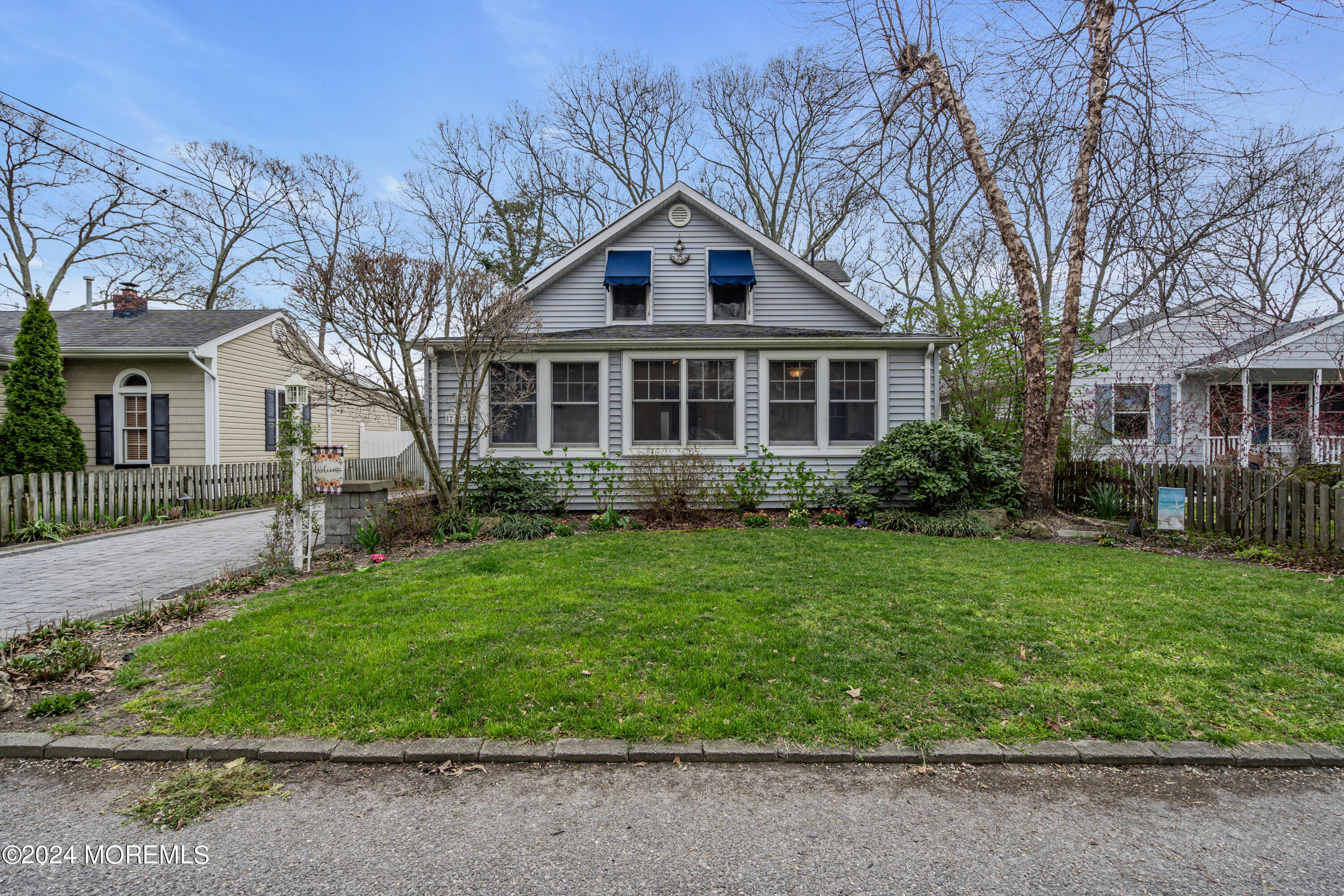 2412 Dunkle Road Point Pleasant, NJ 08742 - Photo 49 of 51 front view of a house with a yard