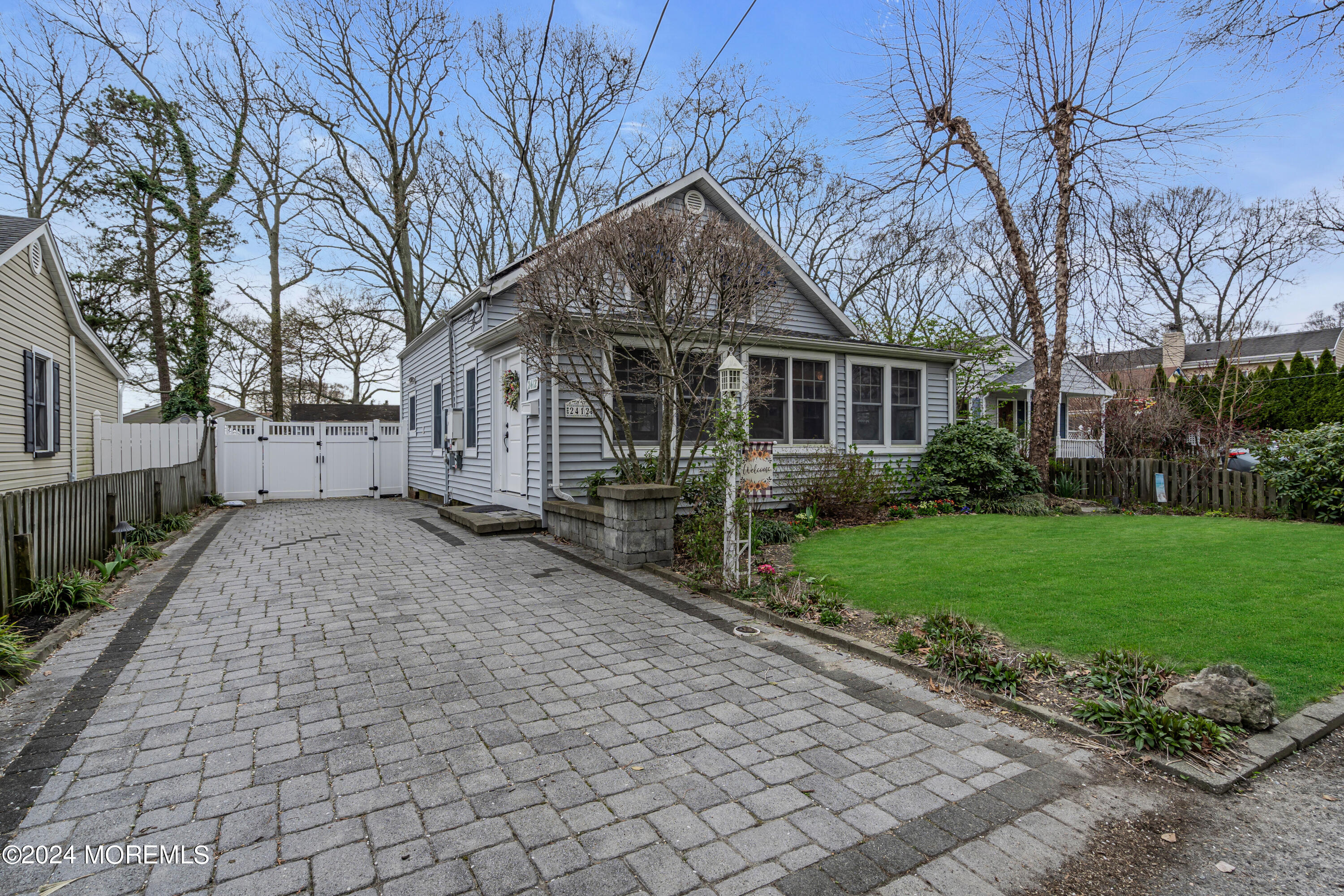 2412 Dunkle Road Point Pleasant, NJ 08742 - Photo 5 of 51 a front view of house with a garden