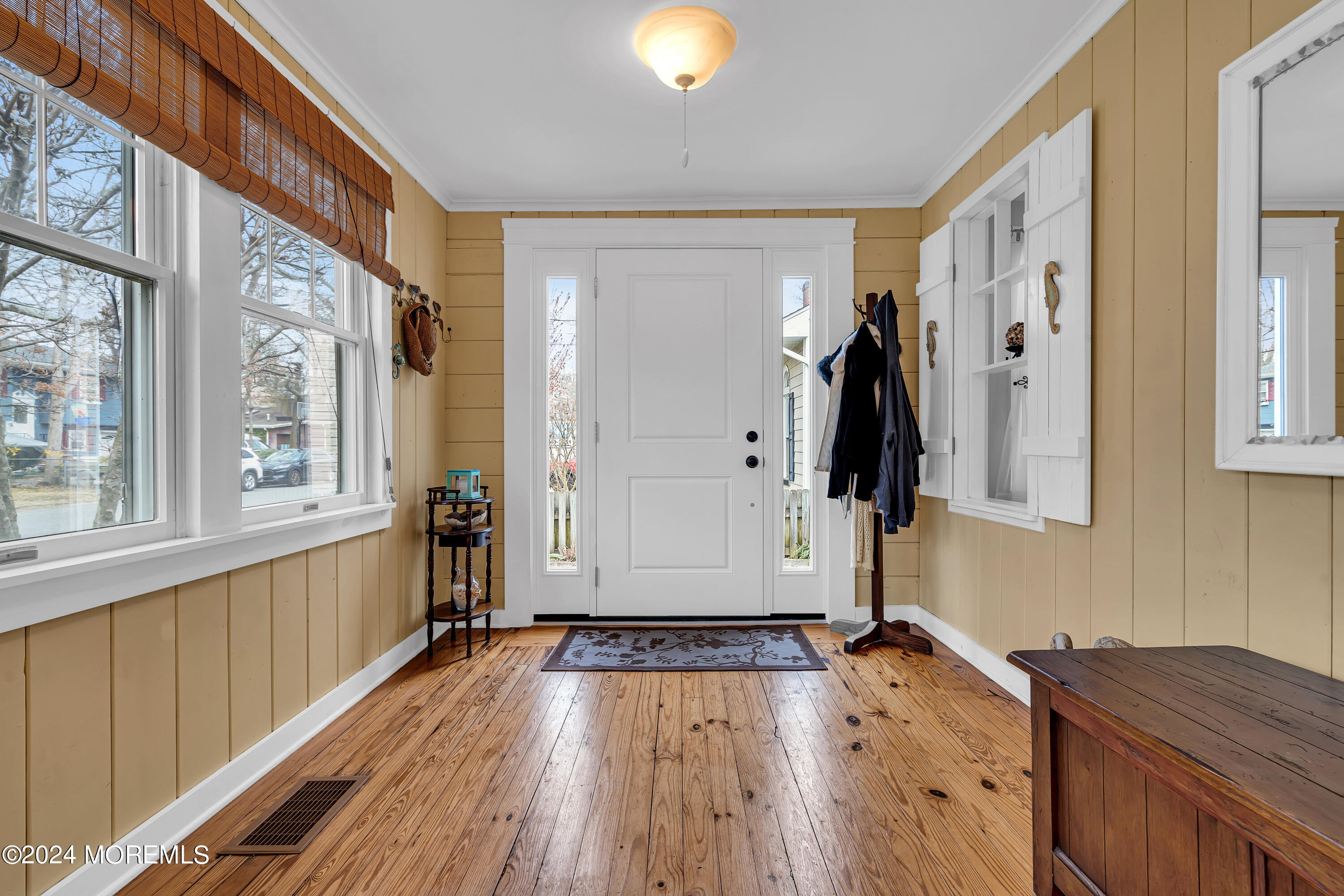 2412 Dunkle Road Point Pleasant, NJ 08742 - Photo 7 of 51 a view of a livingroom with wooden floor and a window