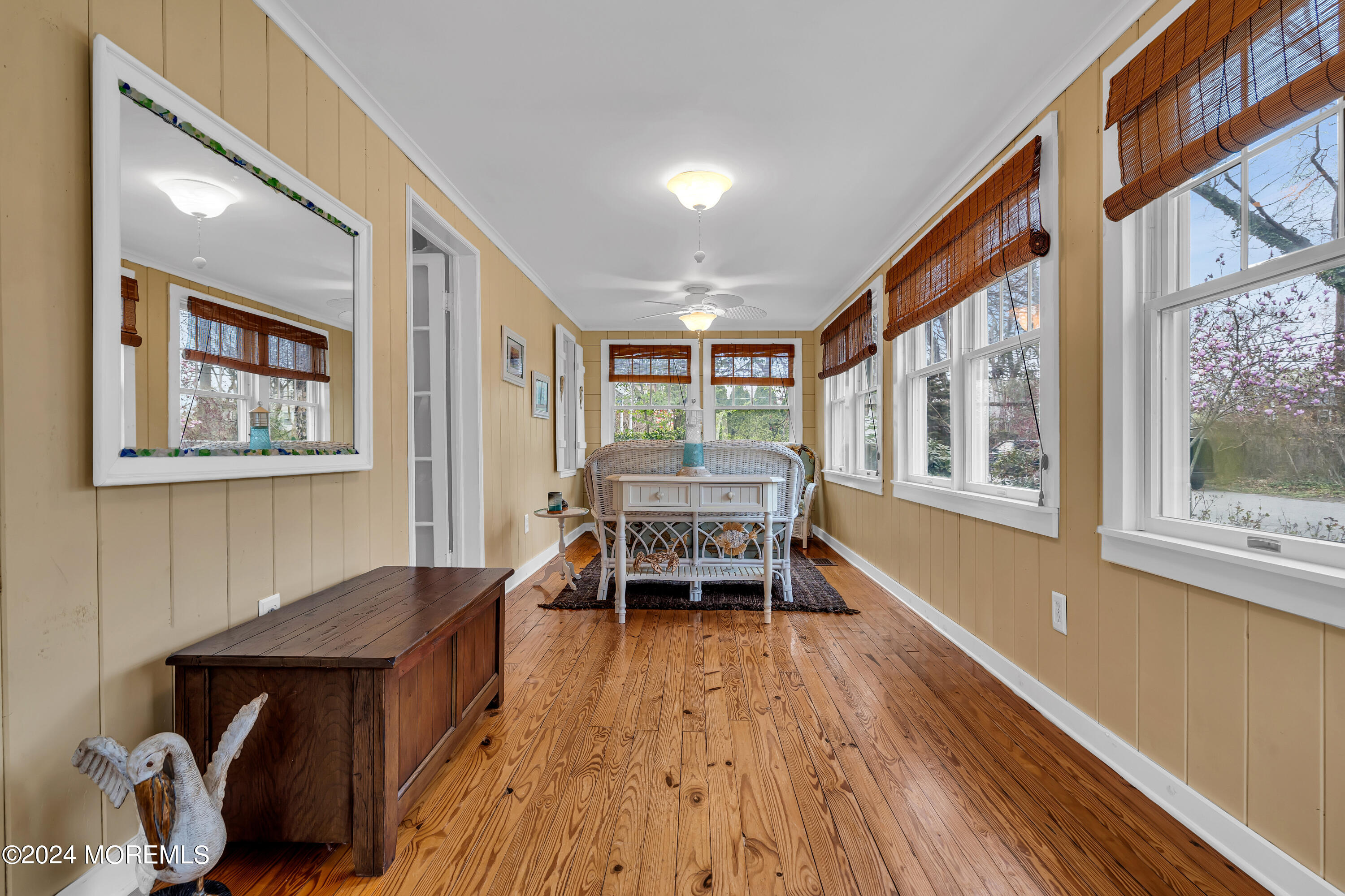 2412 Dunkle Road Point Pleasant, NJ 08742 - Photo 8 of 51 a dining room with wooden floor and a window