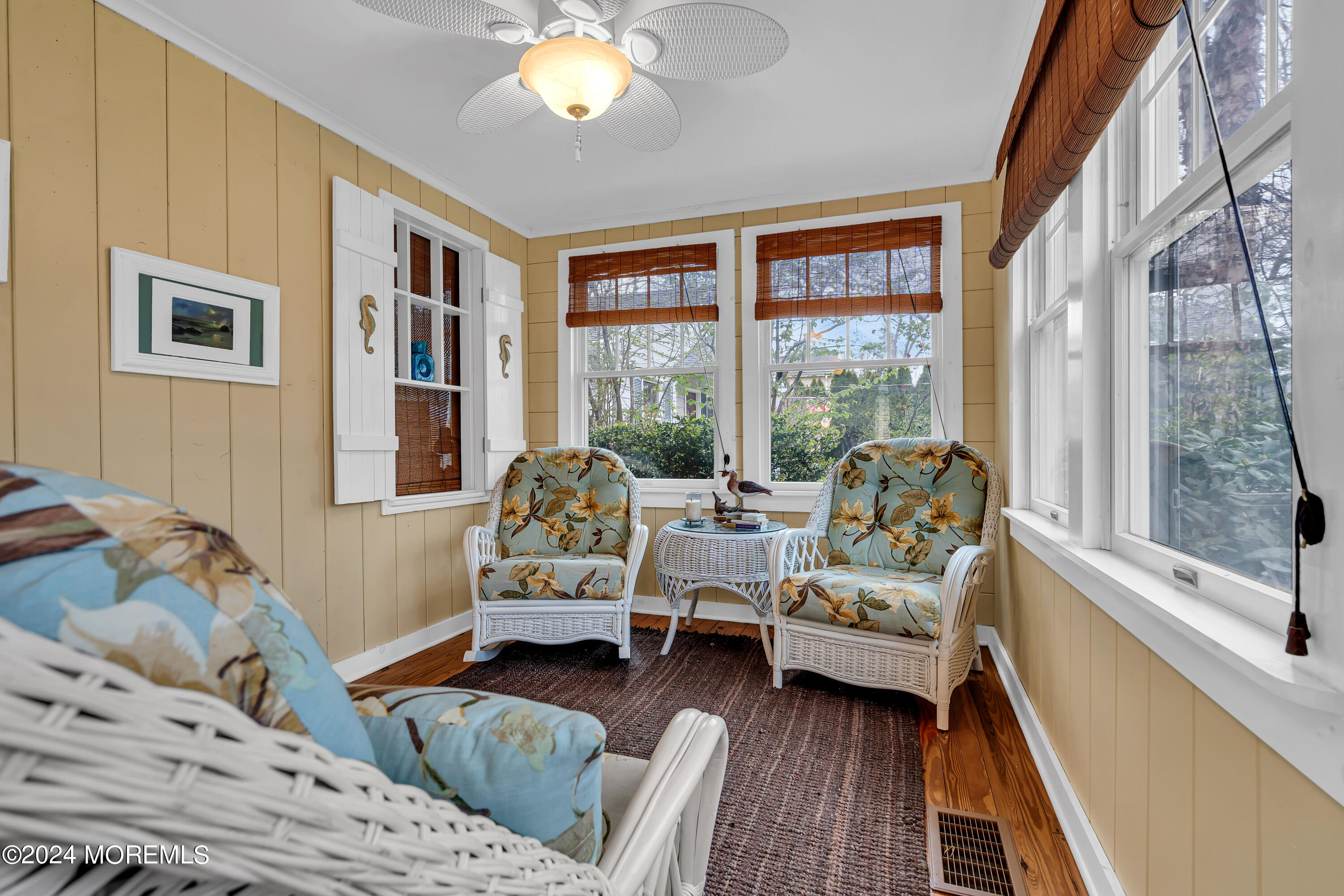 2412 Dunkle Road Point Pleasant, NJ 08742 - Photo 10 of 51 a living room with furniture and large windows