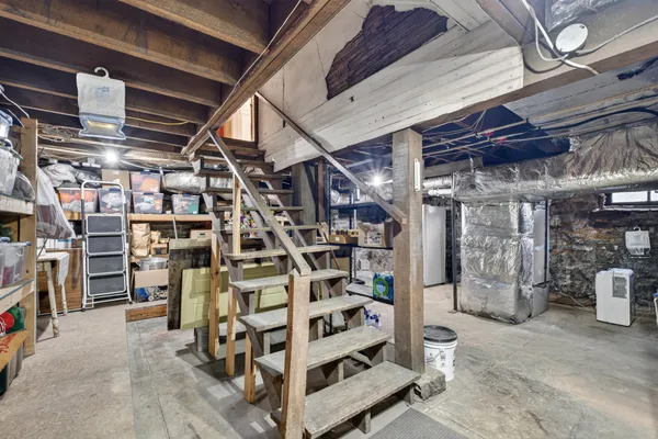 a view of a kitchen with a car parked in it