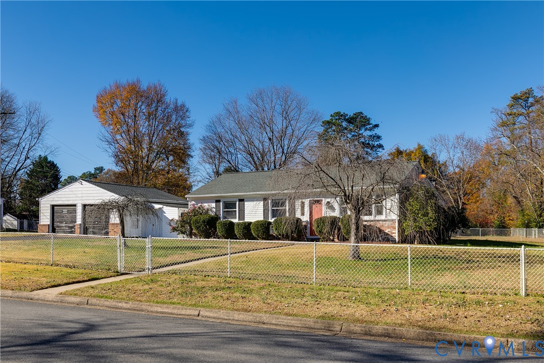 9814 Durango Road Henrico, VA 23228 - Photo 4 of 27 a view of a house with a yard