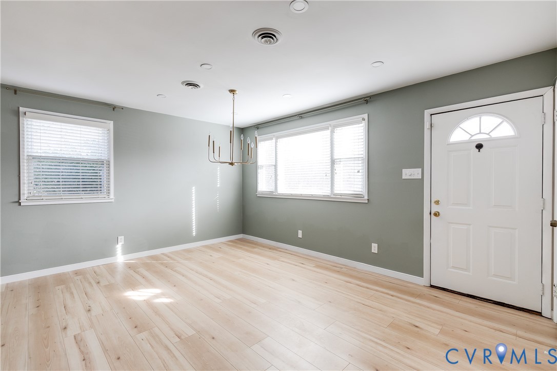 9814 Durango Road Henrico, VA 23228 - Photo 6 of 27 a bedroom with bed and window