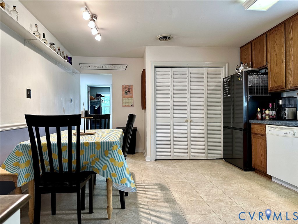 7817 Woodbrook Road Quinton, VA 23141 - Photo 6 of 28 Kitchen area featuring a pantry with louvered bi-f