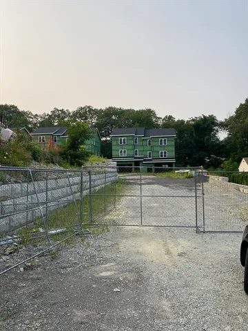 a view of swimming pool with a yard