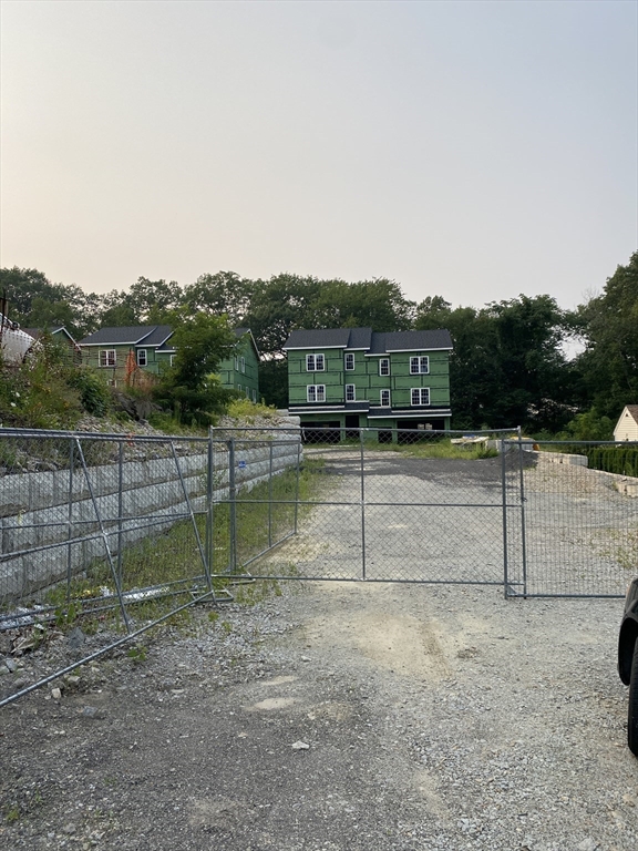 47 Fourth Street Worcester, MA 01602 - Photo 3 of 9 a view of swimming pool with a yard