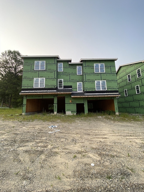 47 Fourth Street Worcester, MA 01602 - Photo 6 of 9 a front view of a house with a garden