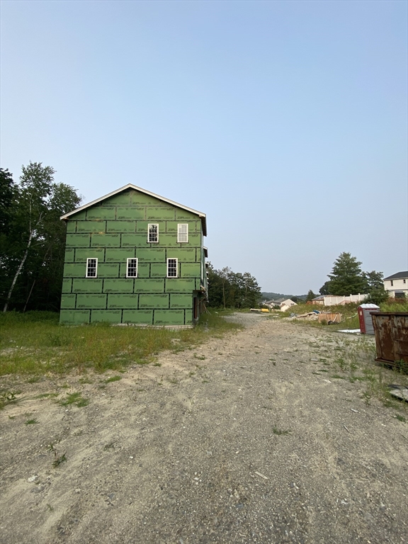 47 Fourth Street Worcester, MA 01602 - Photo 8 of 9 a view of a house with a yard