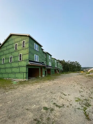 a front view of house with lake view