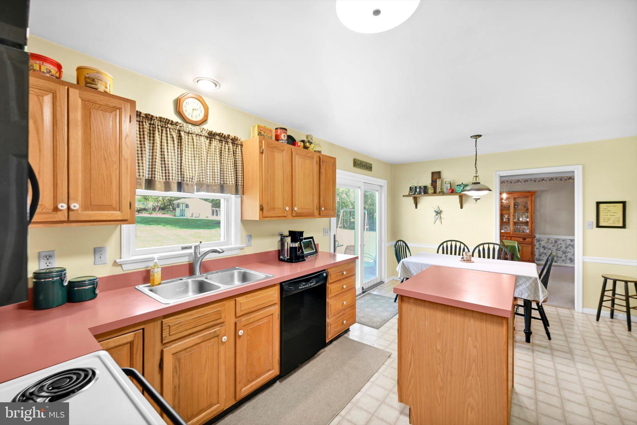 30 Edgewood Drive Lititz, PA 17543 - Photo 14 of 47 a kitchen with a sink stove and cabinets