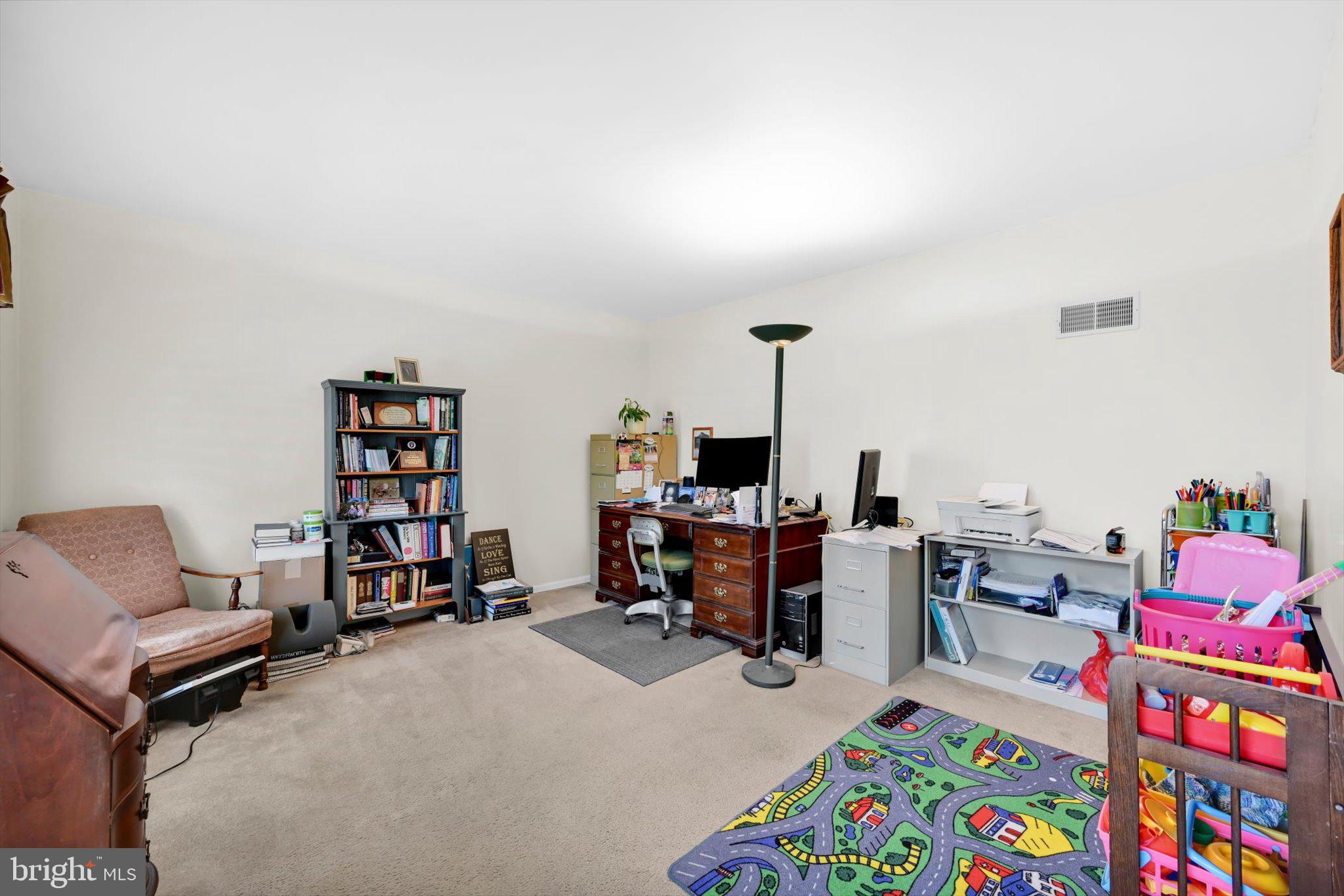 30 Edgewood Drive Lititz, PA 17543 - Photo 16 of 47 a bed room with furniture and a book shelf