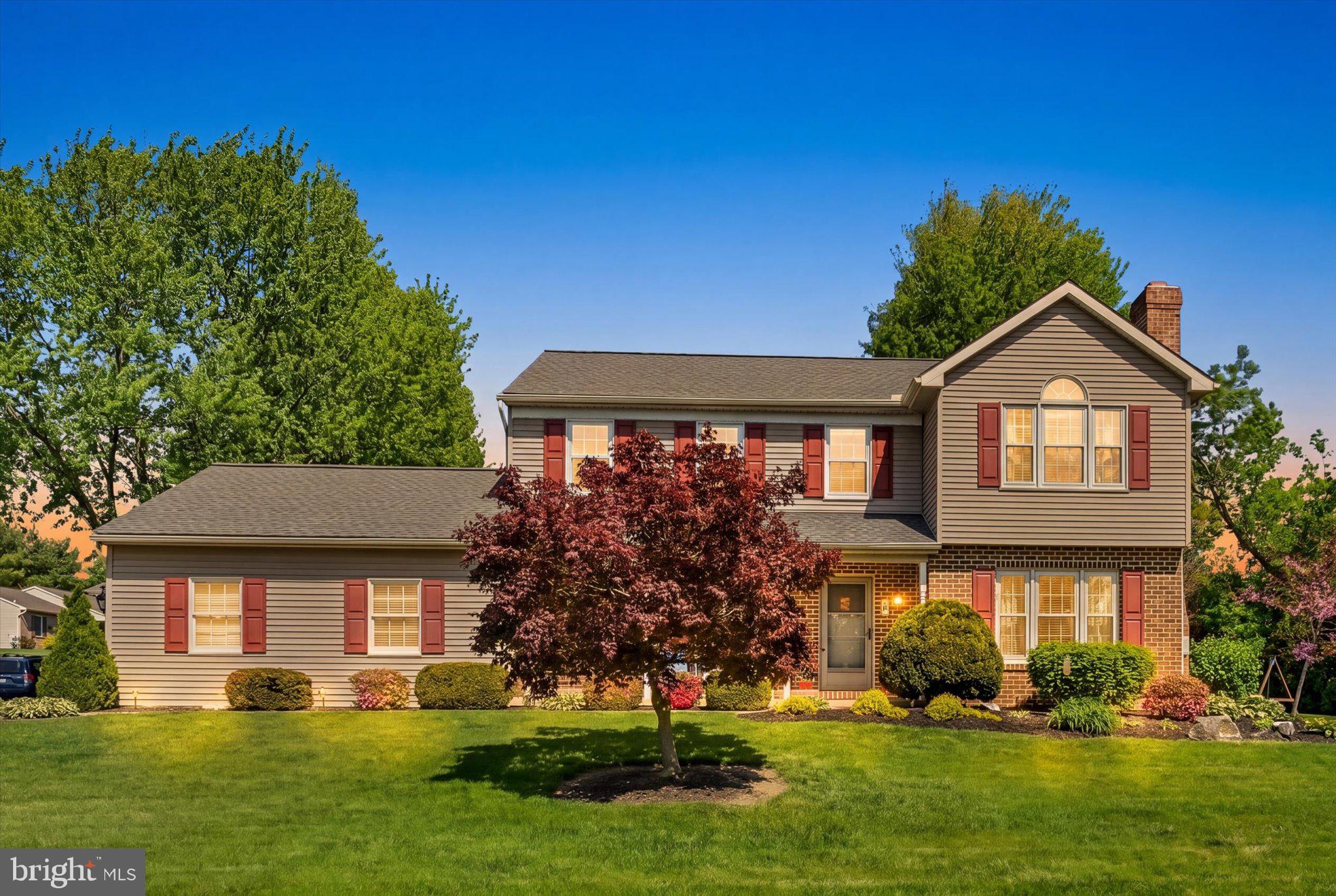 30 Edgewood Drive Lititz, PA 17543 - Photo 2 of 47 a front view of a house with a yard and trees