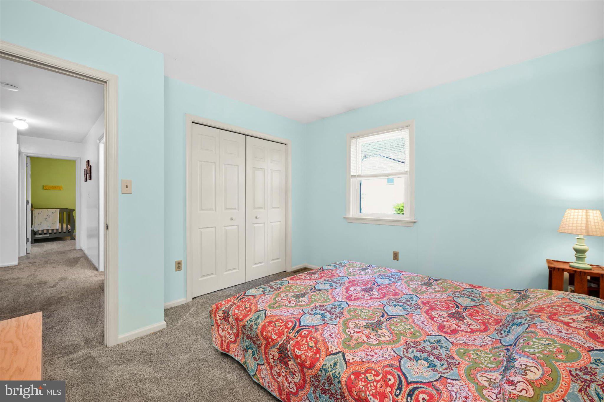 30 Edgewood Drive Lititz, PA 17543 - Photo 21 of 47 a bedroom with a bed and a lamp