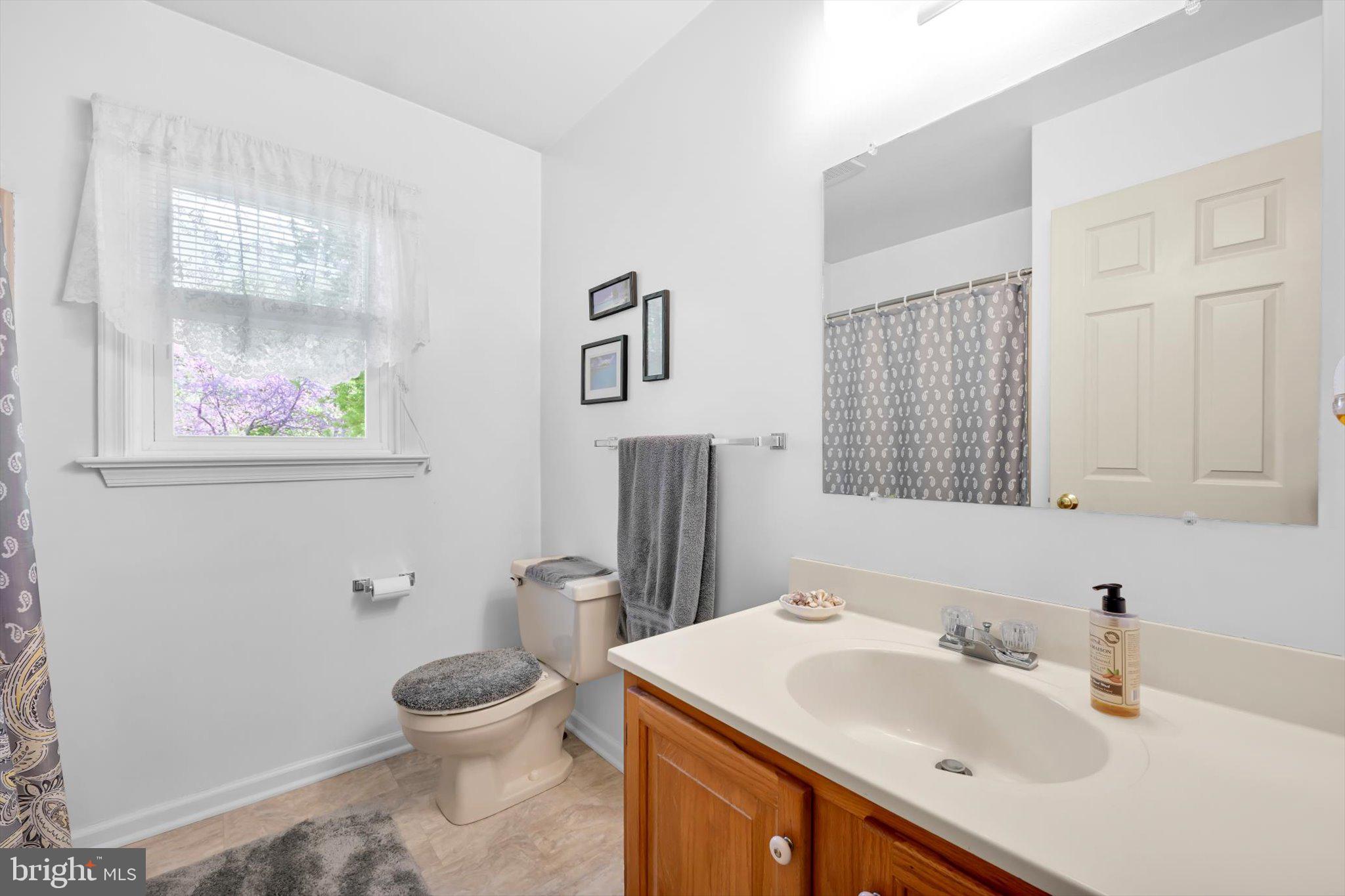 30 Edgewood Drive Lititz, PA 17543 - Photo 23 of 47 a bathroom with a sink toilet and a mirror
