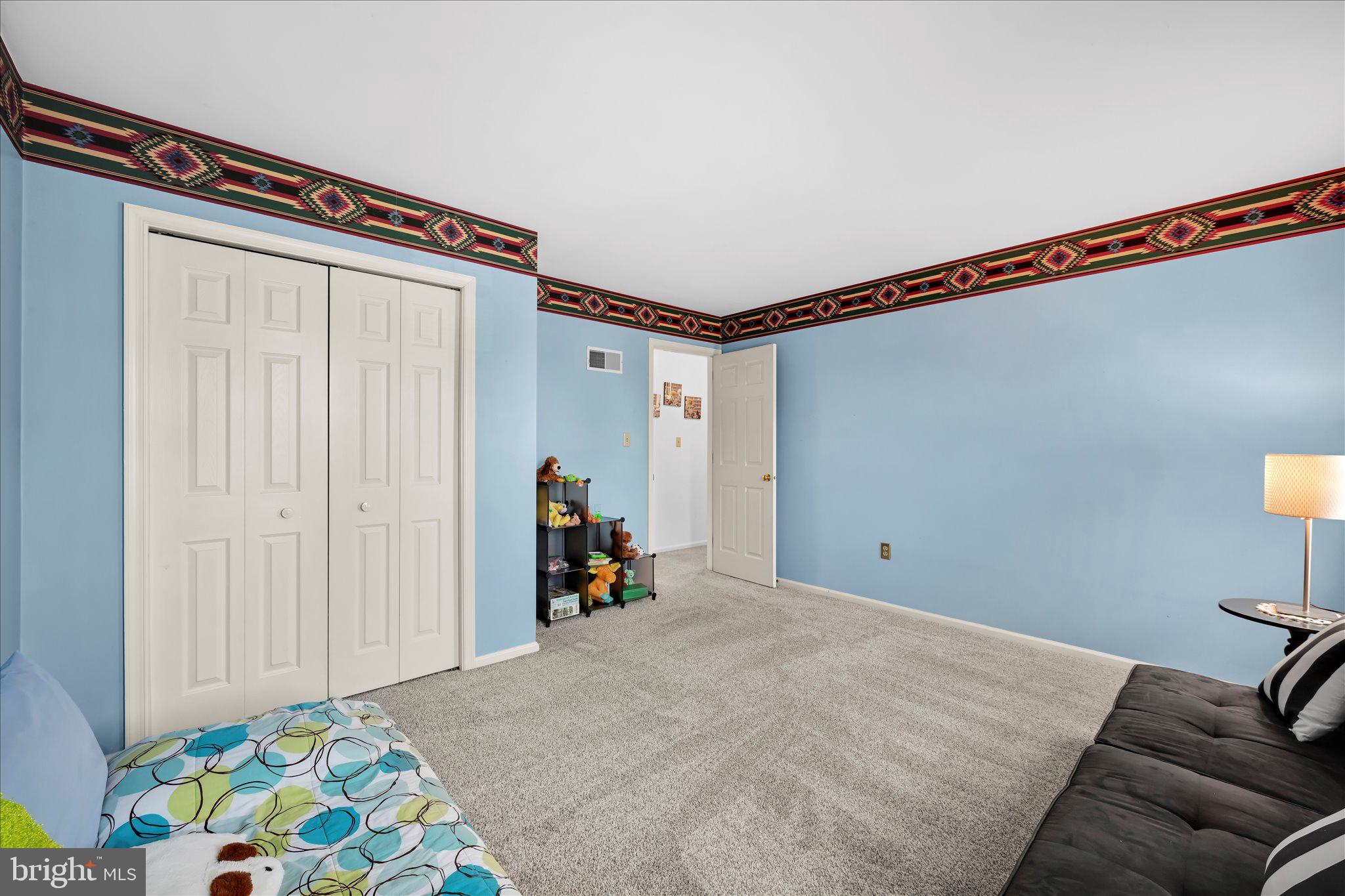 30 Edgewood Drive Lititz, PA 17543 - Photo 28 of 47 a view of a bedroom with a bed and a window