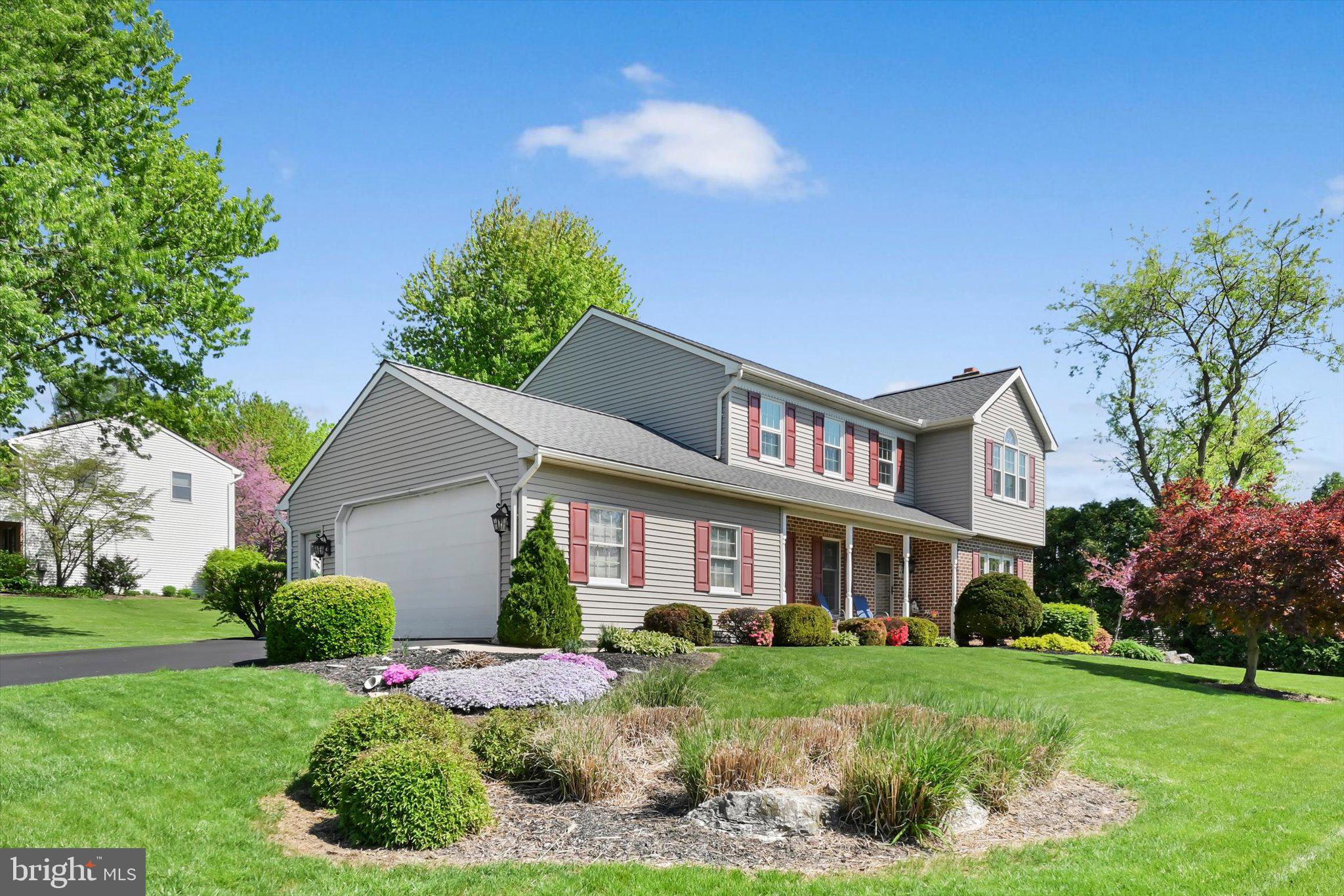 30 Edgewood Drive Lititz, PA 17543 - Photo 4 of 47 a front view of a house with a yard