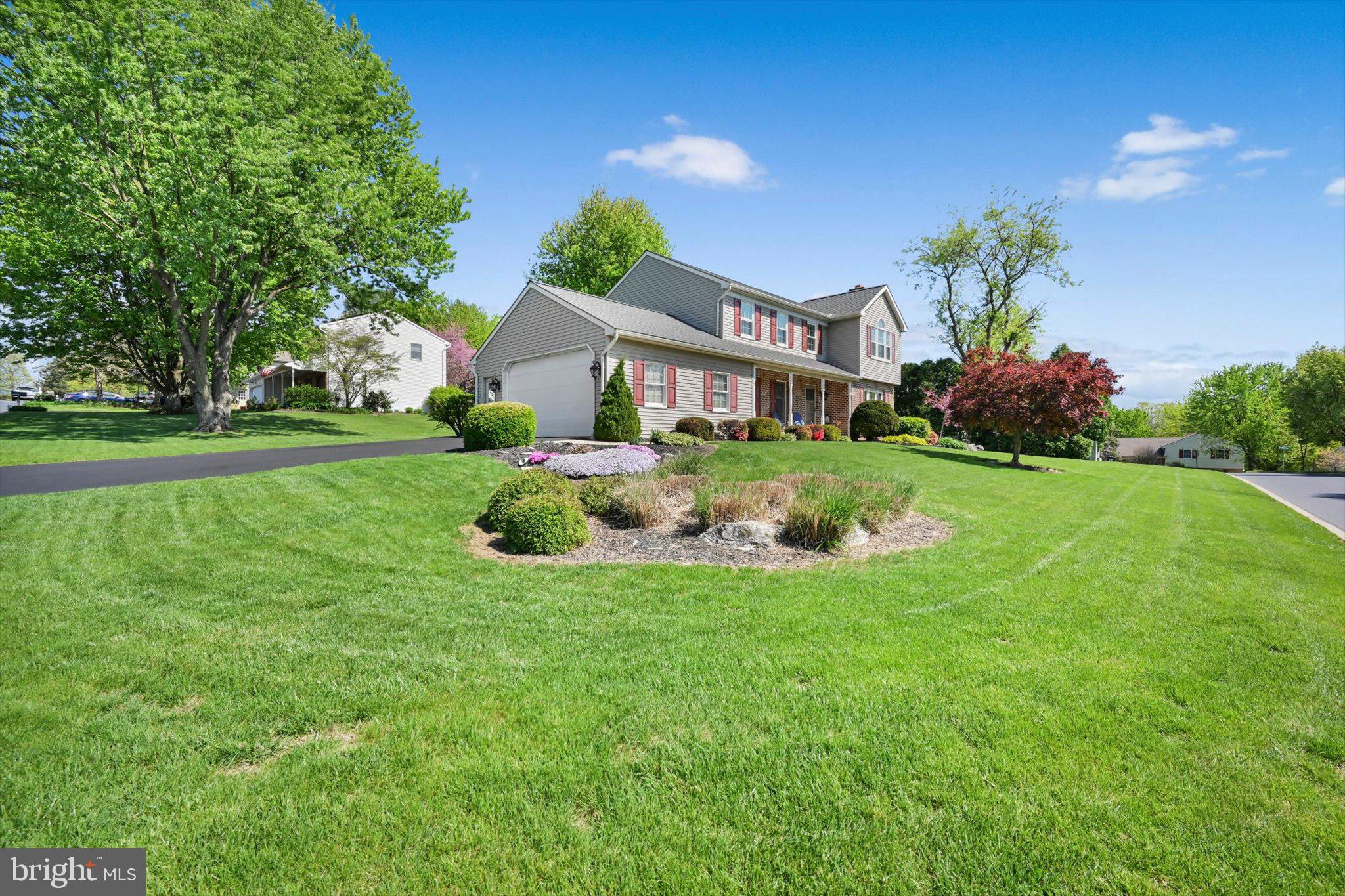 30 Edgewood Drive Lititz, PA 17543 - Photo 43 of 47 a view of a house with a big yard and potted plants