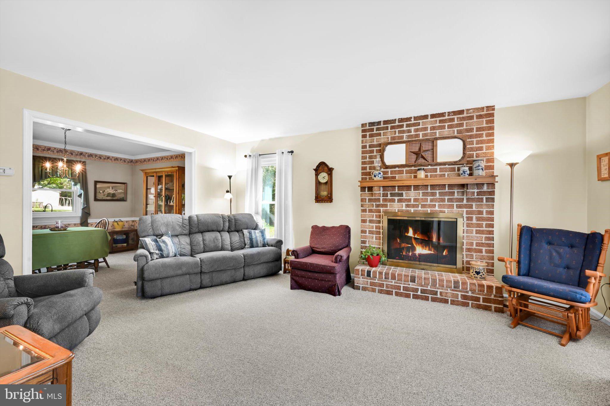 30 Edgewood Drive Lititz, PA 17543 - Photo 7 of 47 a living room with furniture and a fireplace