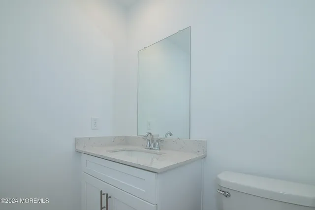 a bathroom with a sink and a toilet