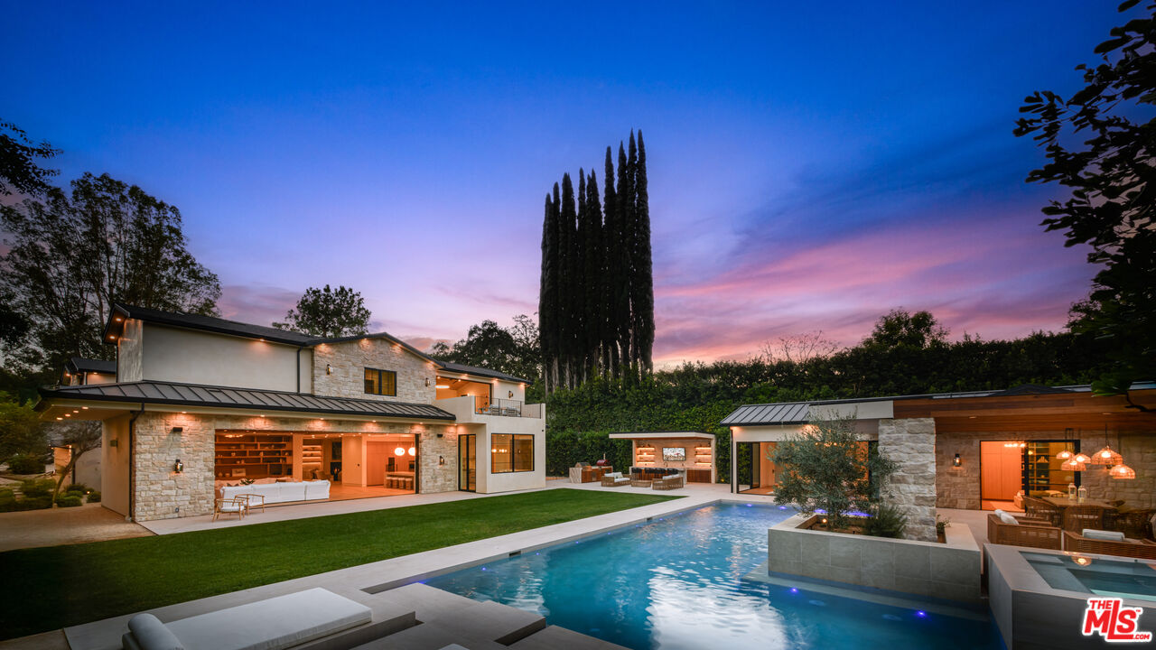 17321 Rancho Street Encino, CA 91316 - Photo 20 of 52 a view of a lake with a house in the background