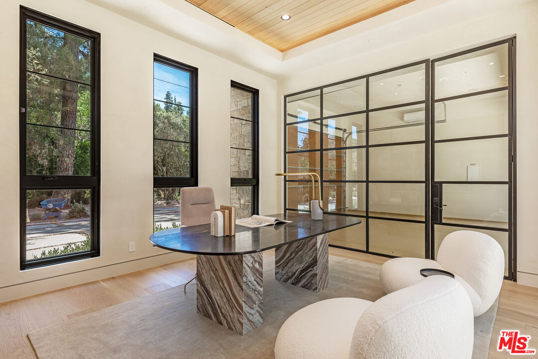 17321 Rancho Street Encino, CA 91316 - Photo 32 of 52 a living room with furniture