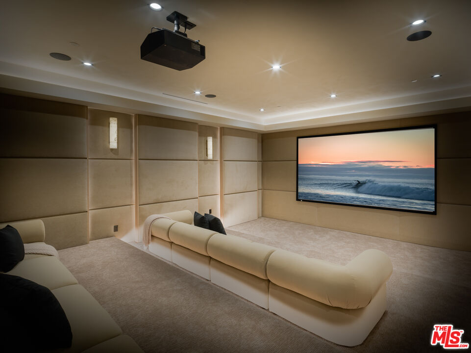 17321 Rancho Street Encino, CA 91316 - Photo 39 of 52 a projector room with couch