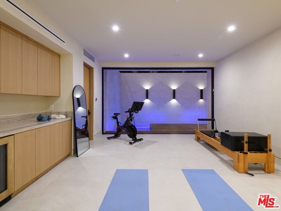 17321 Rancho Street Encino, CA 91316 - Photo 40 of 52 a view of a room with gym equipment