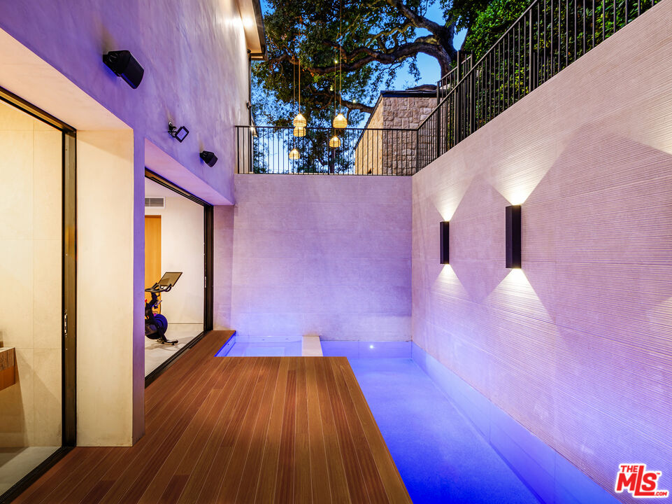 17321 Rancho Street Encino, CA 91316 - Photo 41 of 52 a view of a entryway door with wooden floor