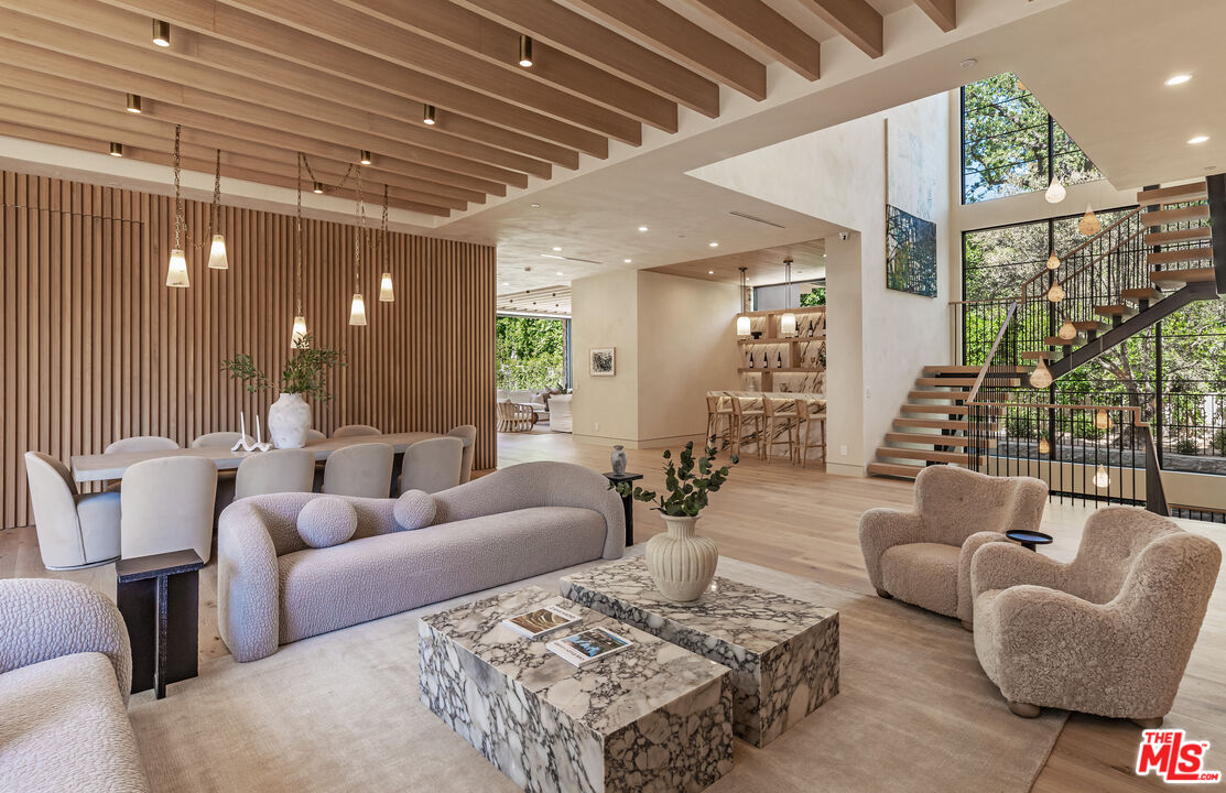 17321 Rancho Street Encino, CA 91316 - Photo 7 of 52 a living room with furniture and wooden floor