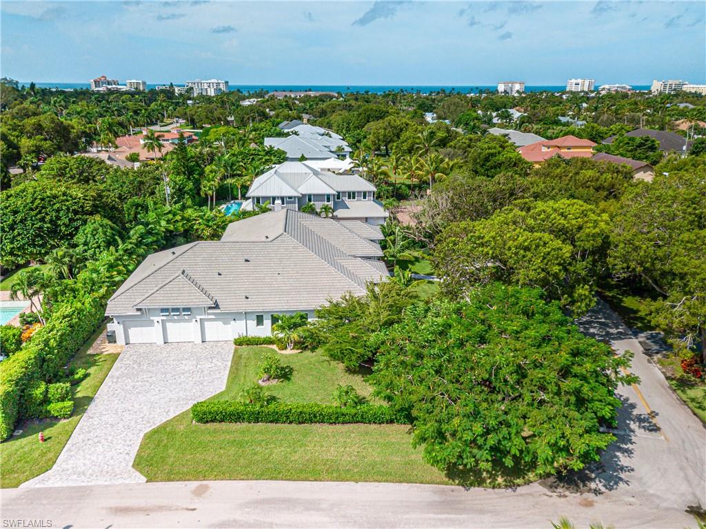 680 Yucca Road Naples, FL 34102 - Photo 31 of 31 an aerial view of a house with a garden