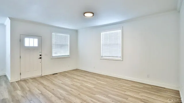 an empty room with windows